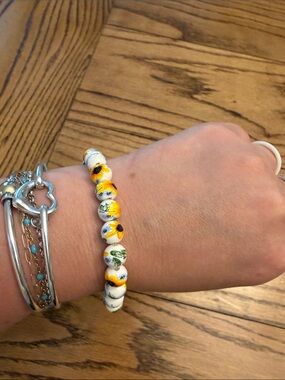 NWT - T. Jazelle stacker bracelet with sunflowers on the beads.